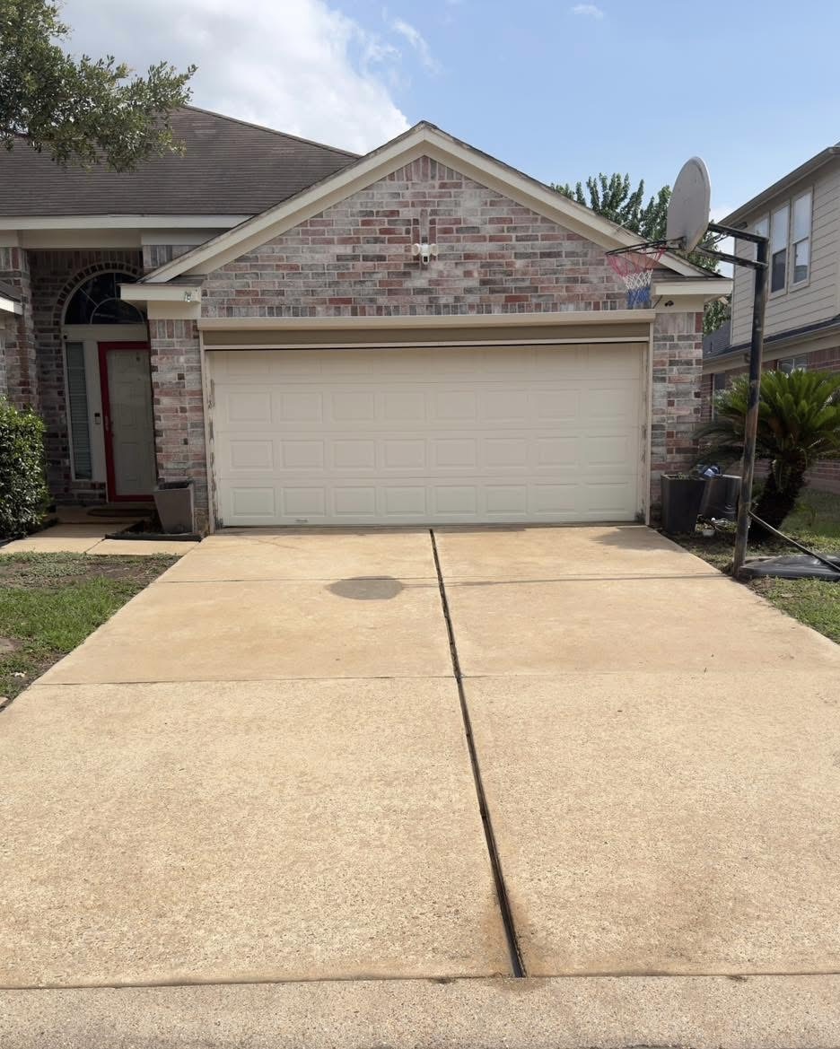 After pressure washing driveway Katy TX - results by Killer Wash