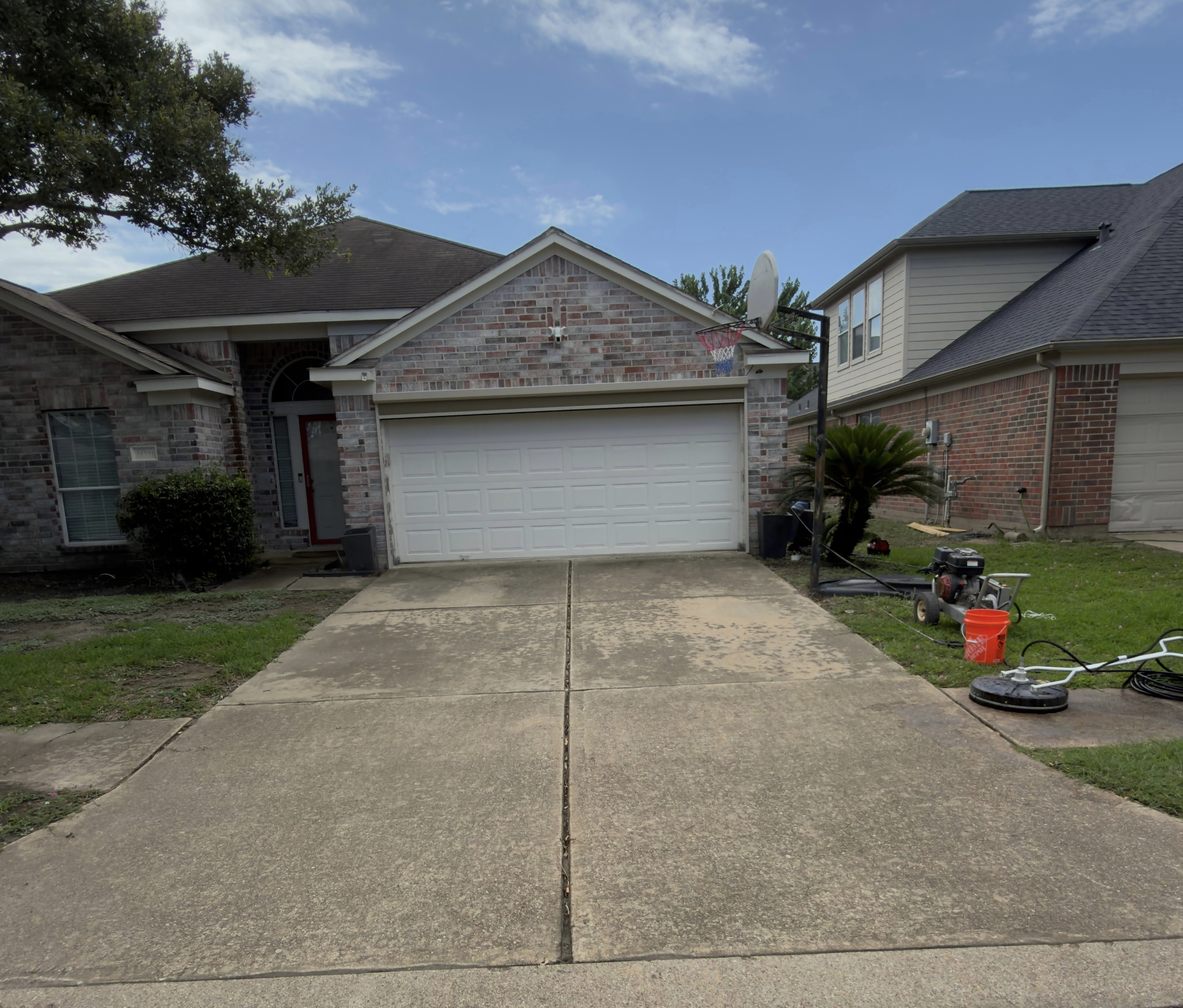 Before pressure washing driveway Katy TX